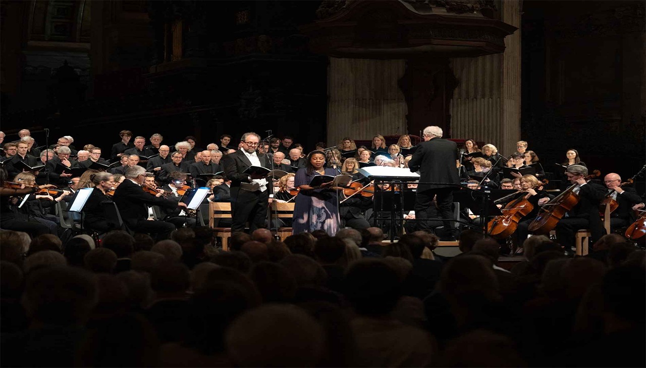 John Rutter conducts in St Paul’s Cathedral.